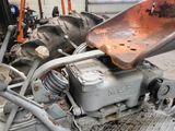 a tractor that is parked in a garage