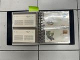 a binder that has a bunch of stamps on it