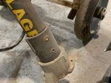 a close up view of a bicycle with a bag on it