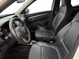 the interior of a car with black leather seats and a steering wheel