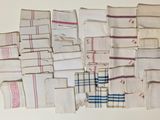 many different types of napkins laid out on a table