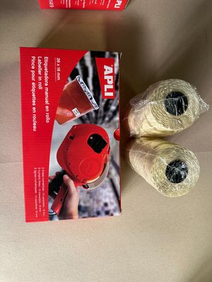 a box of yarn and a pair of scissors on a table