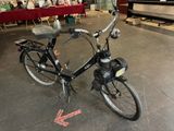 a bicycle that is parked in a garage