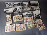 a lot of old postcards that are on the table