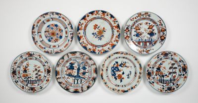 six plates with different designs on them on a white surface