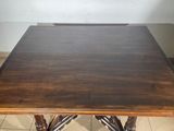 an image of a wooden table with a brown top