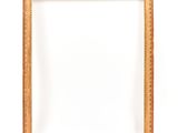 an empty wooden frame on a white background