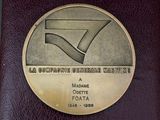 a picture of a plaque with a picture of a pipe on it