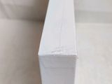 a close up of a piece of wood with paint on it