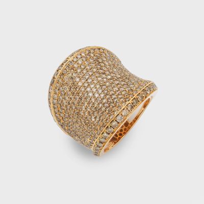 a gold ring with white diamonds on a white background