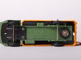 a close up of a toy train on a white surface