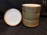 a stack of plates sitting next to each other on a table