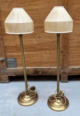 two lamps that are sitting on a table