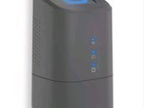 an air purifier with a blue light on top of it