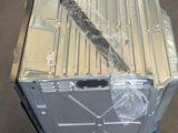 a metal box with a knife on top of it