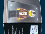 a box with a lego figure inside of it