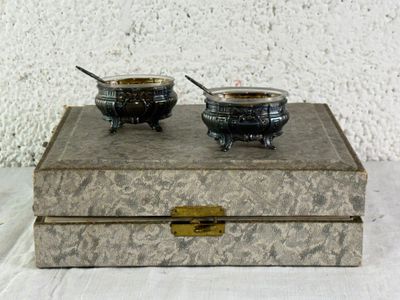 two bowls of soup sitting on top of a box
