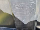 a close up of a metal object with a label on it