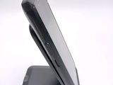 a close up of a cell phone on a stand