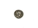 une image représentant une pièce d'argent sur laquelle figure une femme