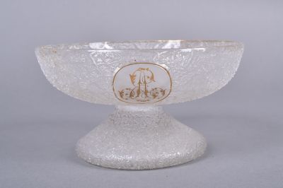 an image of a white glass bowl with a picture of a horse on it