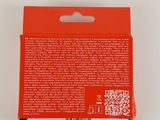 the back of a red box with a qr code on it