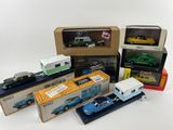 a lot of toy cars and trucks in a box
