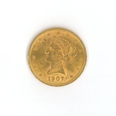 l'image d'une pièce d'or sur laquelle figure une tête de femme