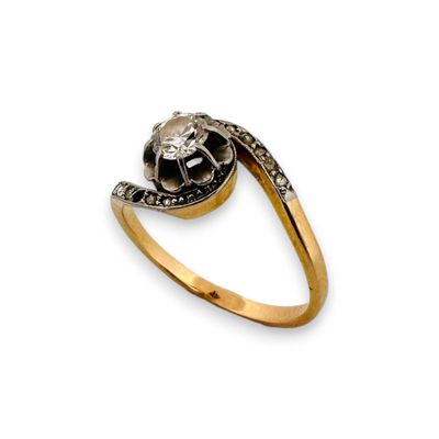 Bague "tourbillon" en or jaune 18K (750 millièmes) et platin…
