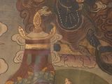 a painting of a man riding a horse on a hill