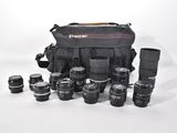the camera bag is full of many different lenses and lenses