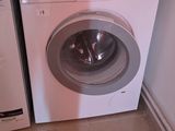a washing machine and a dryer stacked on top of each other