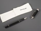 montblanc fountain pen and pouch on a table with a pen in it