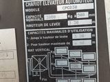 a picture of a sign on the side of a machine