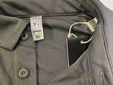 a shirt that has a tag on it