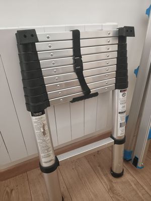 a ladder that is leaning against the wall