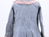 the back of a blue and white checkered jacket on a mannequin mannequin mannequin mannequin mannequin mannequin manne