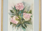 a picture of a painting of pink flowers in a gold frame