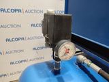 a blue tank with a pressure gauge on it