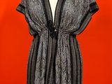an image of a woman ' s dress on a mannequin