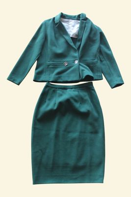 a picture of a green skirt suit and jacket