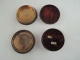 four different types of silver and tortoises on a white surface
