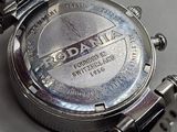 a close up of a watch on a table