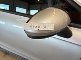 a sticker on the side mirror of a car