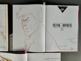 a book with a drawing of a man in a suit and tie