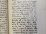 an open book with a black and white picture on it