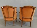 pair of louis xv style armchairs in the manner of louis xv