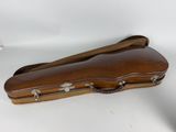 a wooden case that is sitting on a table