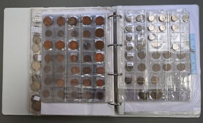 a book with a bunch of coins inside of it
