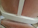 a close up of a chair that has a seat on it